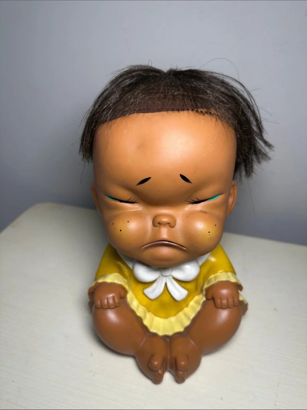 Vintage Moody Cutie grumpy Yellow Baby Doll Figure with Brown Hair Made in Japan